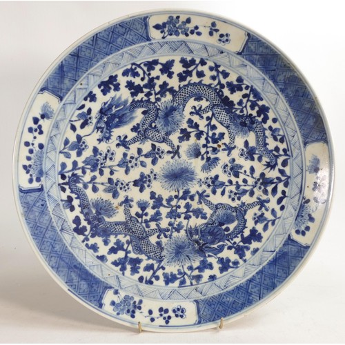 1724 - 19th century large blue & white dragon charger, diameter 41cm.