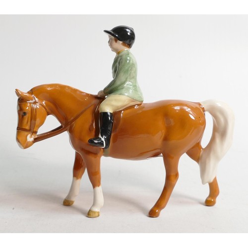 673 - Beswick Boy on Palomino pony, model 1500.