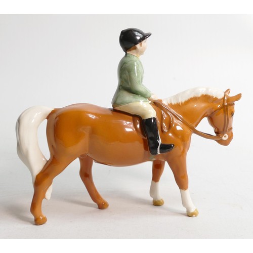 673 - Beswick Boy on Palomino pony, model 1500.