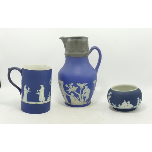 125 - A group of dark blue Jasper ware dip items to include a Wedgwood circa 1860 Portland Jug with later ... 