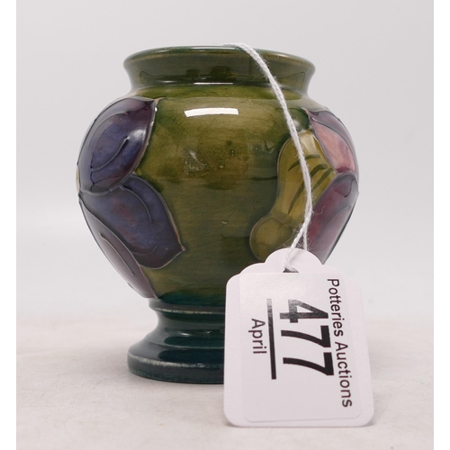 477 - Moorcroft vase in the clematis pattern (or similar), 9cm high.  Original paper label.  Some blemishe... 