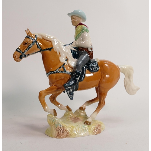 64 - Beswick Cowboy on galloping palomino horse 1377(a/f)