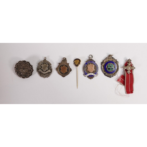 668 - A collection of vintage silver medals including enamelled Northern Island Boxing Cup & Bowling medal... 