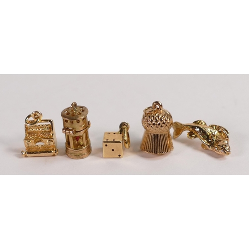 671 - Five 9ct gold charms, typewriter,miners lamp, fish, thistle and dice,10.6g. (5)