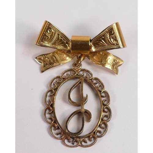 679 - 9ct gold bow brooch/pendant, 4.8g.