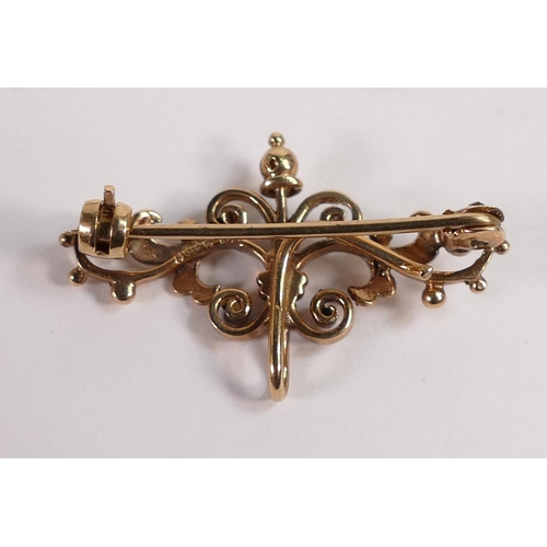 691 - 9ct gold ornate brooch, 2.9g.