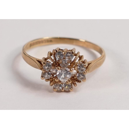 695 - 9ct gold ring set with a cluster of white stones, size Q, 1.9g.