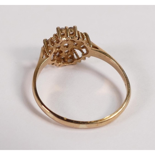 695 - 9ct gold ring set with a cluster of white stones, size Q, 1.9g.