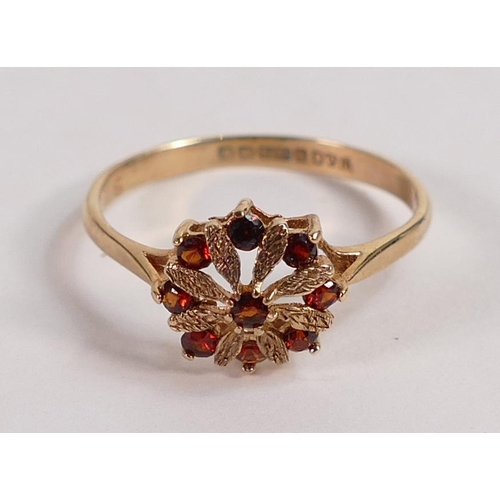 701 - 9ct gold ring with red stone cluster, size P, 1.4g.