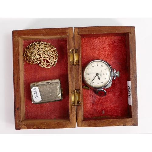 666 - A mixed collection of items to include Ingersoll Triumph Stopwatch, White Metal Pill box, Mercedes B... 