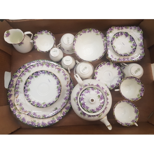 54 - Royal Doulton 'Violet' H3747 pattern teaware to include 6 trios, teapot, milk and sugar, two cake pl... 