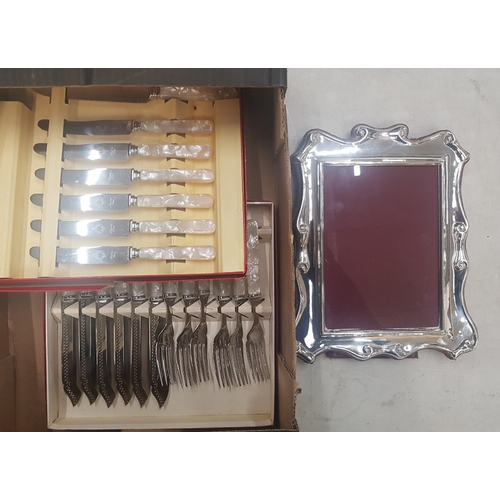 65 - Two boxed mother of pearl dessert cutlery and fish knife set together with Sterling Silver Photofram... 