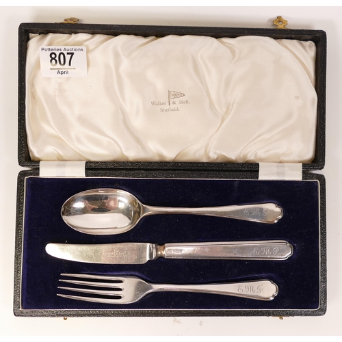 807 - Cased hallmarked silver knife, fork & spoon, weight excluding knife 102.7g.