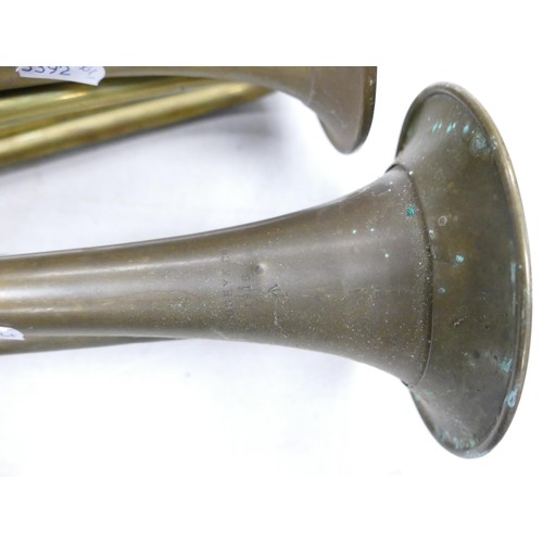 365 - Two American brass bugles, one with US motif & the other a Boosey & Co. 1916 item, length 43cm (2)