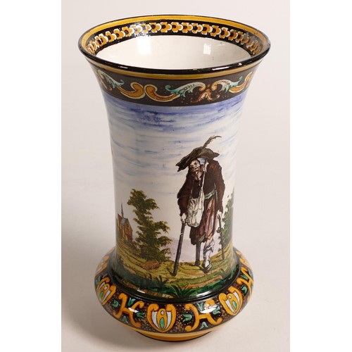 171 - Early 20th century continental Faience vase decorated with old woman and man in church yard, h.21cm.... 