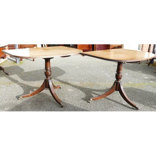 504 - 19th century mahogany D-end dining table on double tripod supports & fitted with brass castors (no e... 