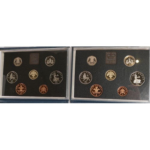 657 - A collection of United Kingdom proof coin sets by Royal mint. Comprising of 1983 x 2, 1984 x 2, 1985... 