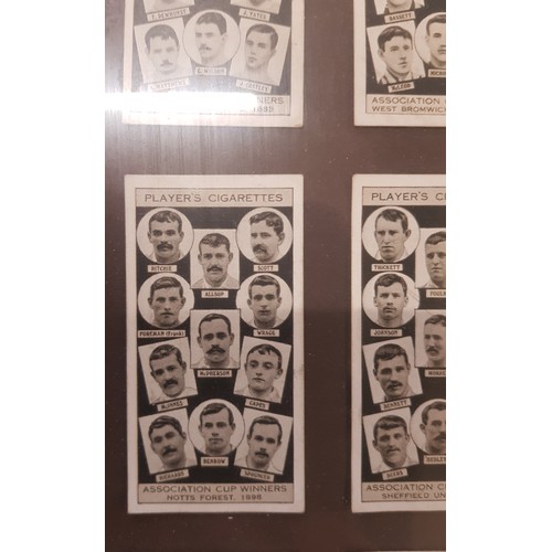 495A - A framed collection of Player's Cigarette cards depicting FA Cup winners from the late 19th and earl... 