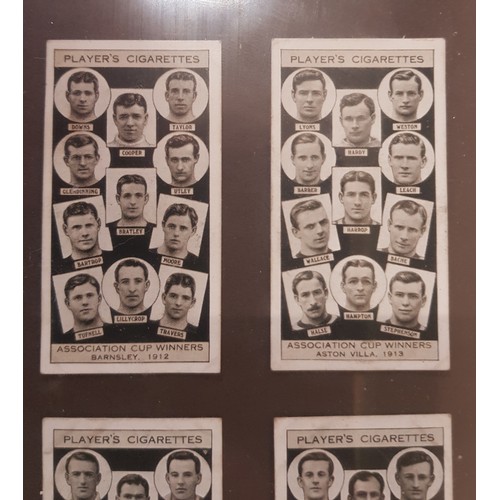 495A - A framed collection of Player's Cigarette cards depicting FA Cup winners from the late 19th and earl... 