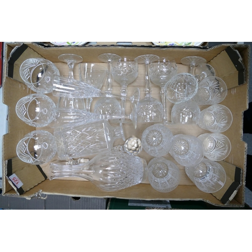 125 - A collection of crystal Wine, Whisky , Champagne glass ware & similar decanters