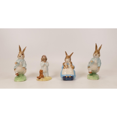 379 - Beatrix Potter figures to include Peter Rabbit x 2, Mrs Rabbit and Bunnies together with Royal Doult... 