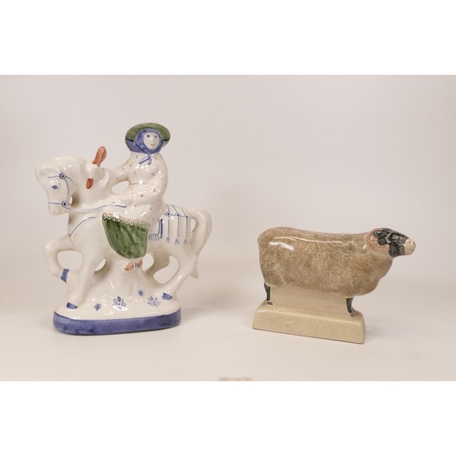 385 - Two Rye pottery figures girl on horse back and a ram (2)