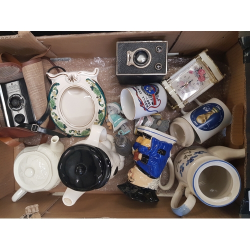 32 - A mixed collection of ceramic items to include Masons Photo frame, 1982 World cup Mug, novelty tea p... 