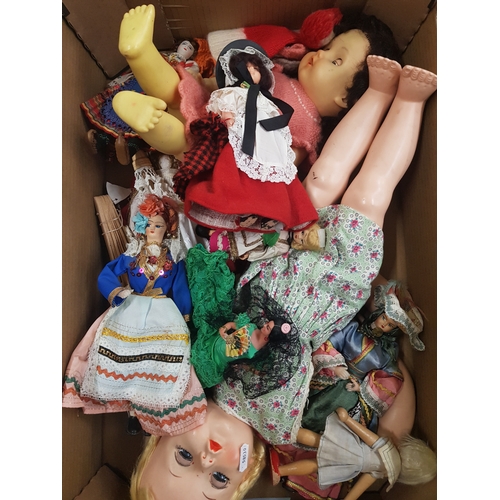 41 - A mixed collection of vintage dolls and accessories