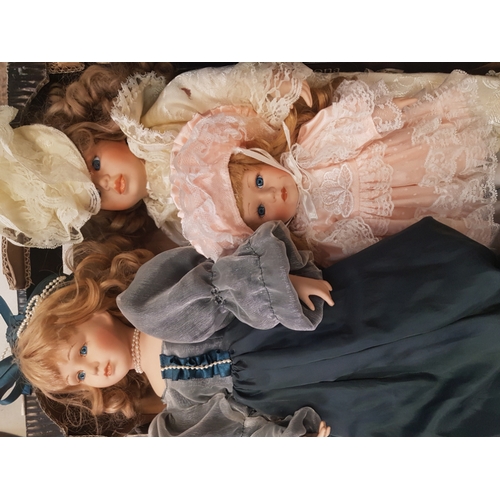 315 - Four Vintage Porcelain Dolls to include one smaller Leonardo Collection example (4)