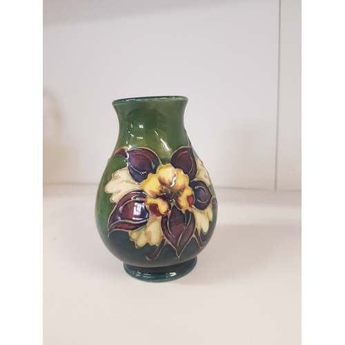 347 - Moorcroft Columbine pattern vase on green / blue ground Height 9.5cm