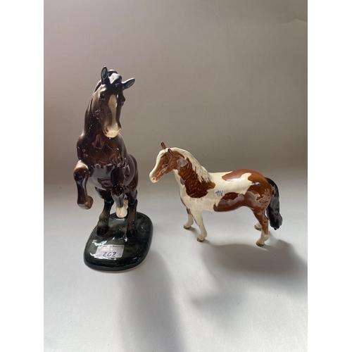 202 - Beswick skewbald pinto pony 1373 together with Beswick Welsh Cob 1st Version 1014 (2)