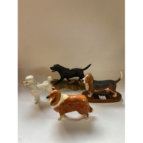 204 - Royal Doulton Matt Black Labrador on base together with Beswick Connoisseur Basset Hound 2045A, Besw... 