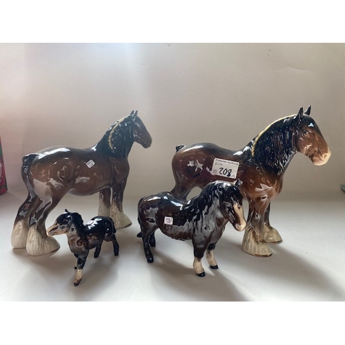 208 - Beswick 818 Shire Horses x 2 together with Beswick Shetland Pony 1033 & Foal 1034 (4)