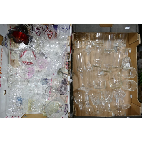 86 - A large collection of glass ware including decanters, flutes, bells, water jugs etc (2 trays)