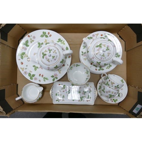 90 - Wedgwood wild strawberry tea and dinner ware to include teapots,  dinner plates, salad plates, cups ... 