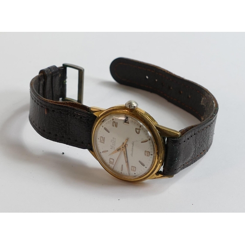 611 - MuDu gentleman's doublematic 1960s wristwatch with leather strap.