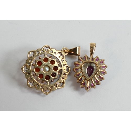 631 - Two 9ct gold pendants, both set with pink stones, 4.4g. (2)