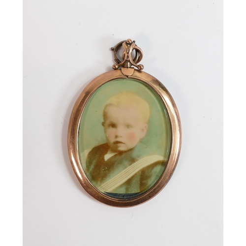 673 - 9ct rose gold large oval portrait pendant, gross weight 23.9g, h.7cm.