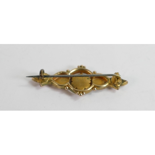 722 - Antique 9ct two colour swallow brooch with steel pin, 2.4g.