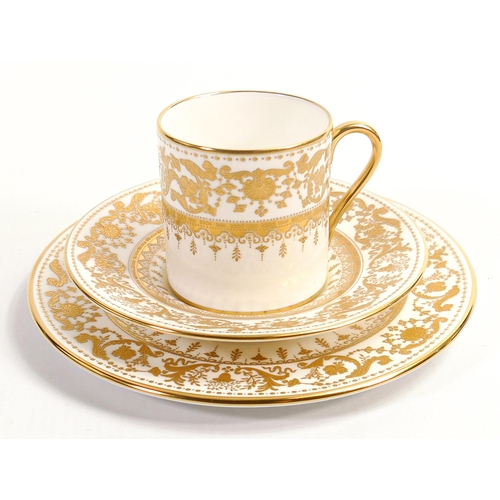 20 - De Lamerie Fine Bone China, heavily gilded Versailles Countess Armorial patterned Trio , specially m... 