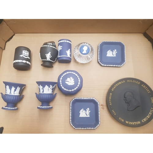 561 - A collection of Wedgwood black and queens blue jasperware items to include table lighter, small urns... 