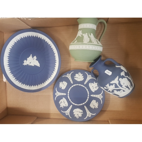 563 - A collection of Wedgwood Jasperware items to include Portland vase, Green jasperware jug & 2 Queens ... 