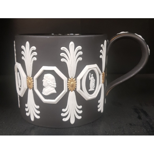 566 - Wedgwood Limited Edition black & Gold / white jasperware tankard by Richard Guyatt