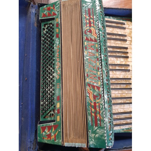 593 - Cased Vintage Mazzini accordion