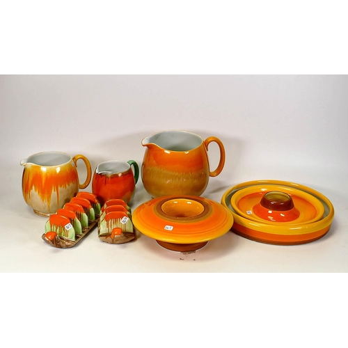 367 - A collection of Orange Shelley Pottery Harmony Ware to include graduated Jug, posy dish, toast racks... 