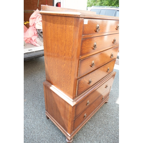 498 - 1930's oak chest on chest with enamelled handles. 132cm high, 92cm wide, 46cm deep