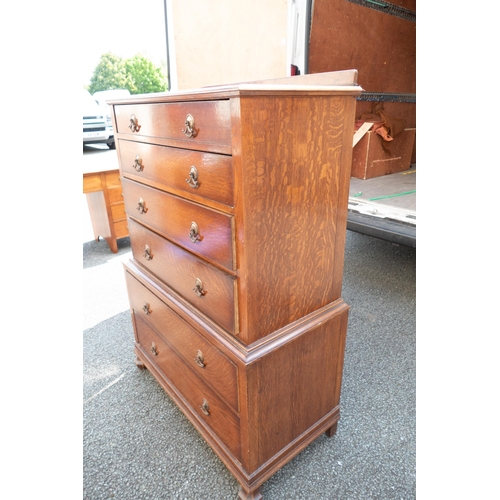 498 - 1930's oak chest on chest with enamelled handles. 132cm high, 92cm wide, 46cm deep