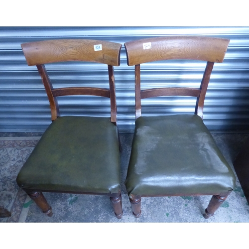 524 - A pair of victorian bar back dining chairs with turned front supports