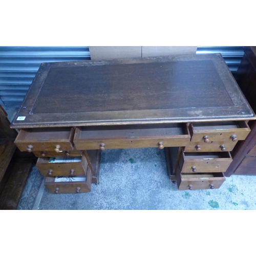 521 - Leather Top Mid Century Oak Pedestal Desk with 9 drawers 122cm W x 60cm