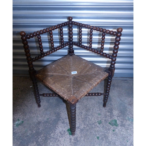 516 - Late victorian arts and crafts Turned Bobbin Oak Rush Seated corner chair circa 1890 (68cm H)